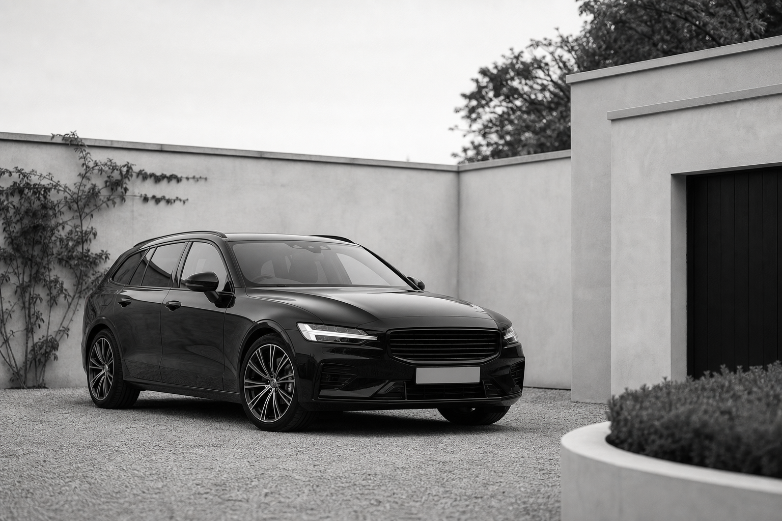 Monochrome vehicle in a minimal architectural setting.